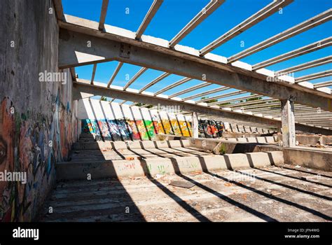 Interior of abandoned factory building, full of graffiti Stock Photo ...