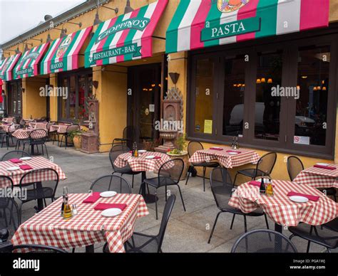 Outdoor Seating At An Italian Restaurant Stock Photo - Alamy