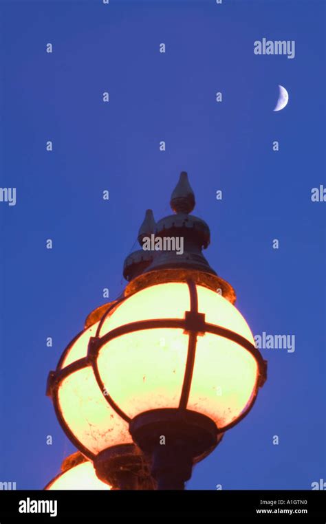 a street light and moon Stock Photo - Alamy