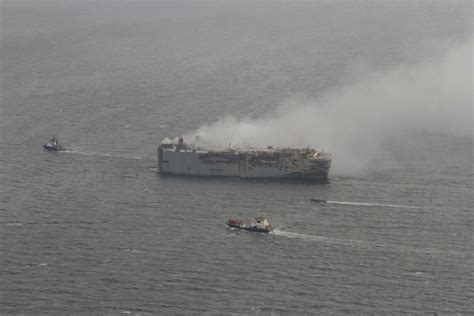 Netherlands car carrier ship fire extinguished; ship moored, not sunk ...