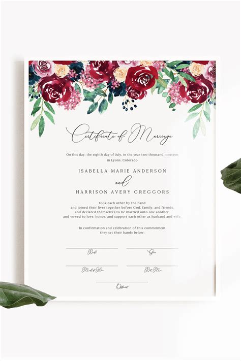 This marriage certificate template features delicate burgundy and navy florals and an ele ...