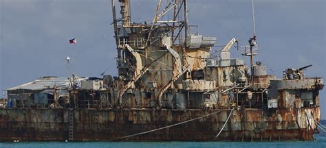 Philippines says refurbishing grounded ship an option to strengthen hold on disputed shoal | Reuters