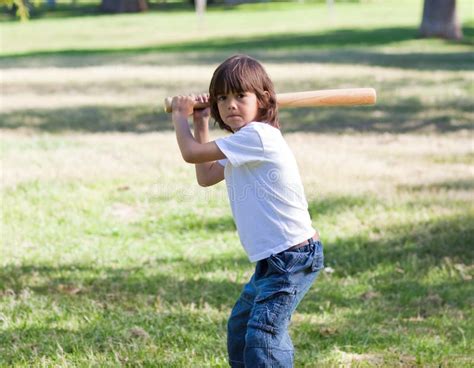 Portrait Of Adorable Child Playing Baseball Stock Image - Image: 12974481