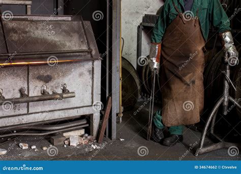 Workers at the smelter stock photo. Image of iron, organization - 34674662