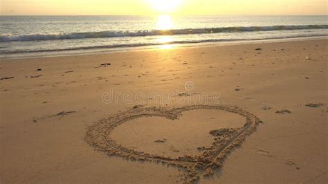 Heart Symbol on Beach, Hand Drawn Heart on Beach Sand Over Sunset or ...