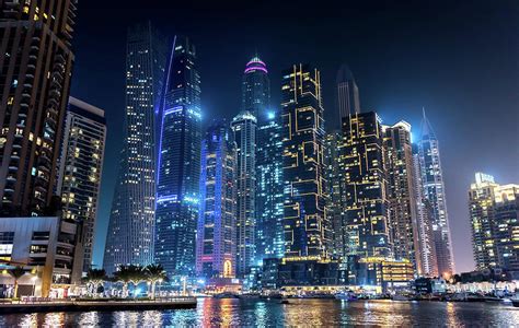 Futuristic night view of Dubai Marina Photograph by Luca Rei - Fine Art America