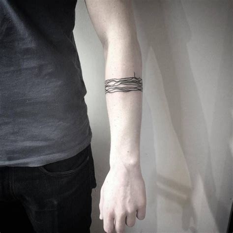 Abstract, minimalist lines tattoo on the left forearm by Vaigirdas Kofy | Line tattoos, Arm band ...