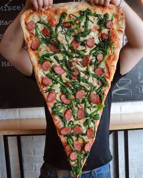 ≡ New Foodie Trend Is A Giant Pizza Slice – The Biggest You've Seen 》 Her Beauty