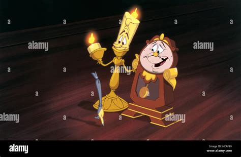 BEAUTY AND THE BEAST, l-r: Lumiere (voice: Jerry Orbach), Cogsworth (voice: David Ogden Stiers ...