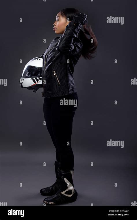 Race car driver holding helmet hi-res stock photography and images - Alamy