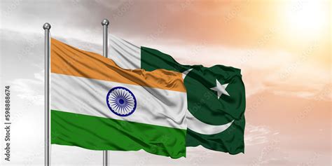 Flags of Pakistan and India friendship flag waving on the sky with ...