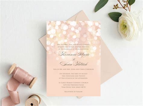 Gold and Blush Bokeh Wedding Invitation printed on metallic | Etsy