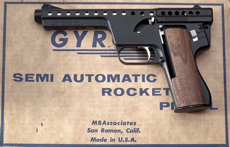 Gyrojet Mark II Model C semi-auto rocket pistol : RetroFuturism