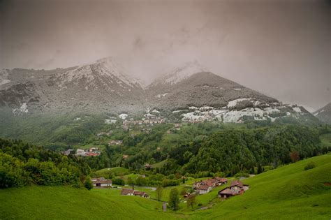 Snow-covered mountain village in spring 5249029 Stock Photo at Vecteezy