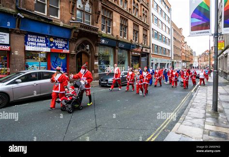 Liverpool 2022 Santa Dash drummers Stock Photo - Alamy