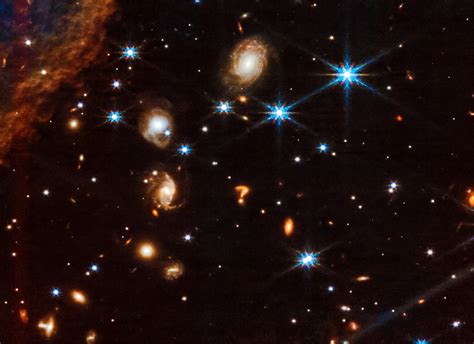 Mysterious "question mark" object captured in deep space by JWST - Earth.com