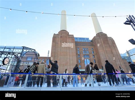 GLIDE ice skating rink at Battersea Power Station Christmas 2022, in SW London, UK Stock Photo ...