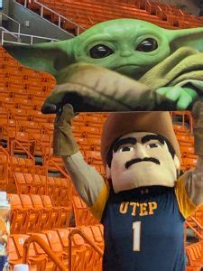 PHOTO UTEP Mascot Holding Baby Yoda Cutout