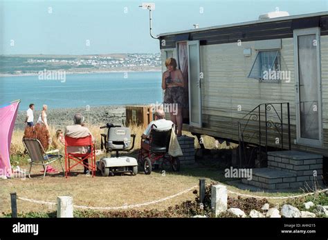 Group of people outside their static caravan at Trecco Bay Porthcawl South Wales UK Stock Photo ...