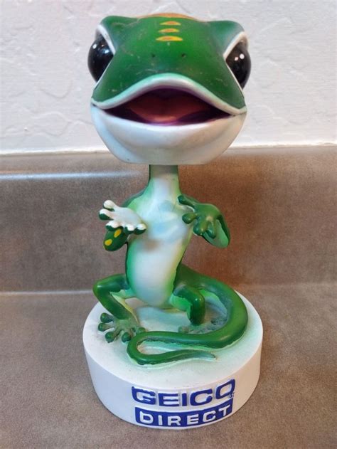 Geico gecko bobblehead in 2024 | Bobble head, Novelty christmas, Holiday decor