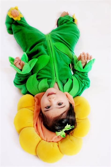 Sunflower baby2 stock image. Image of flower, girl, smiling - 4348505