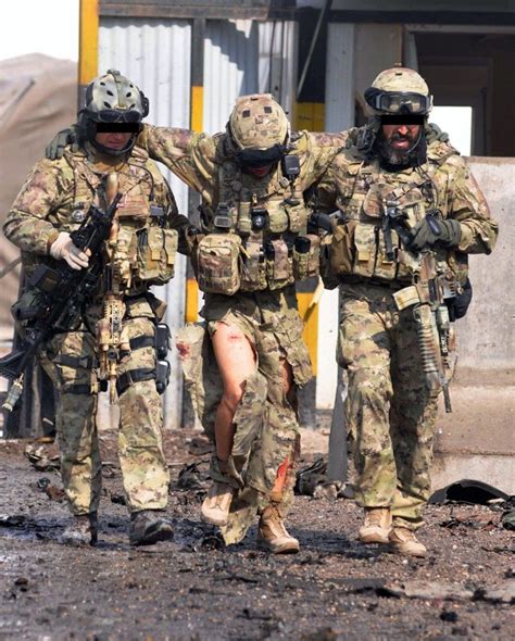 Italian Task Force 45 – Afghanistan. Two members of Caraninieri’s GIS with one of the GOI | Navy ...