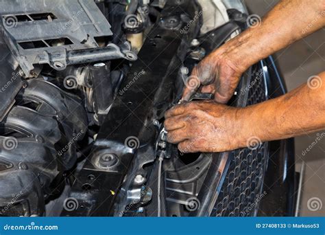 Mechanic repairing engine stock image. Image of maintenance - 27408133