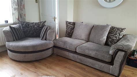 Grey 2 seater sofa and large swivel cuddle chair. | in Dromara, County ...