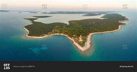 Aerial view of Veli Rat lighthouse and bay on island Dugi Otok in ...