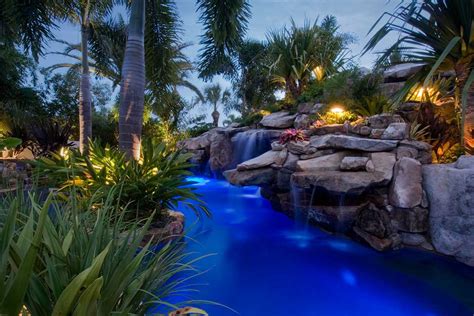 Lagoon Pool and spa with large grotto waterfall and slide by Lucas ...