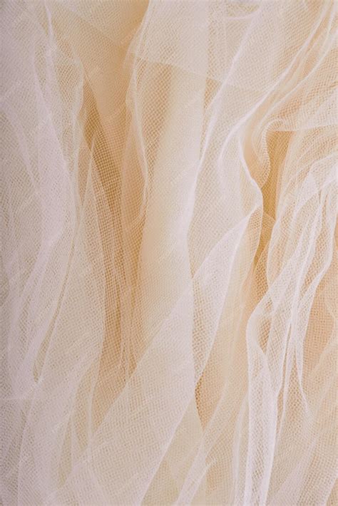 Premium Photo | Cream color fabric texture or background