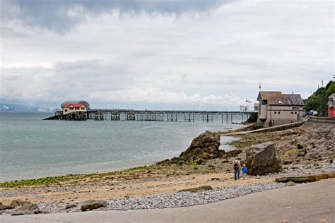 Mumbles Pier in Swansea Bay, Wales Editorial Image - Image of clouds ...