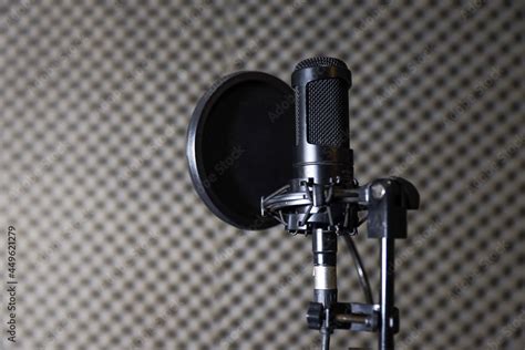 Microphones, condenser mic and mic stand with a recording studio ...