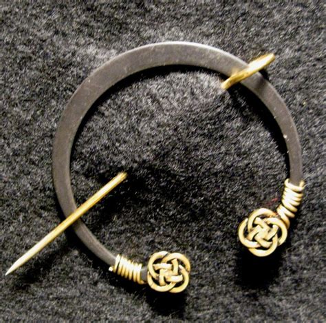 Penannular Brooch with Gold Celtic Knot Finials for Kilt