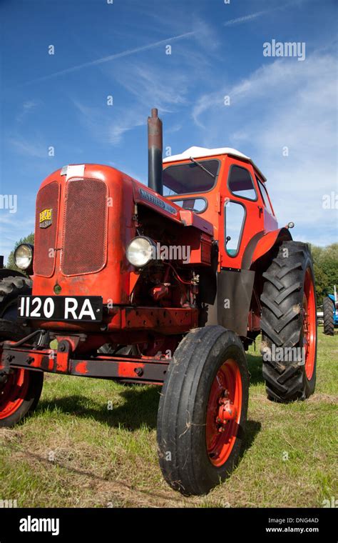 red vintage tractor Stock Photo - Alamy