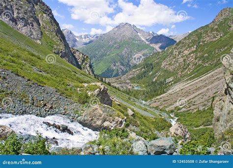 Mountain Landscape, A Stream And Small Lake Royalty Free Stock Photos - Image: 12453508