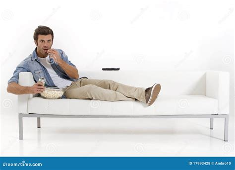 Single Man On The Couch Watching TV Royalty Free Stock Photos - Image ...