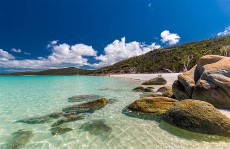 Rocks on Whitehaven Beach with White Sand in the Whitsunday Islands ...