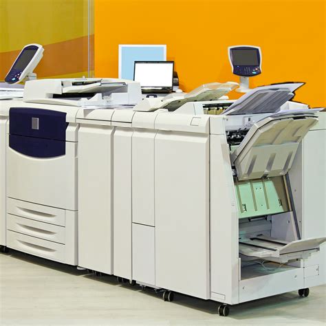 31404116 - big digital printer machinery in copy office - Total Office Concepts