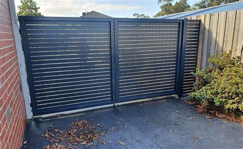 Double Swinging Gates in SE Melbourne | Visser Fencing | Expert installation for stylish and ...