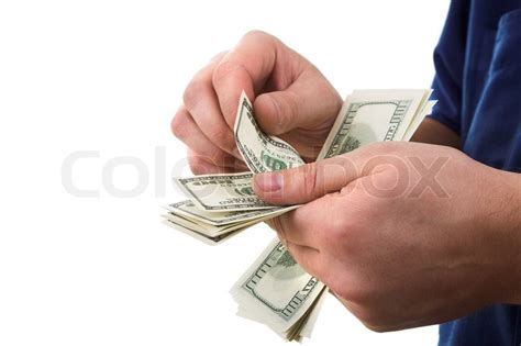 Man's hand counting money isolated on white | Stock Photo | Colourbox