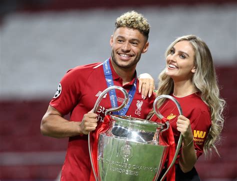 PERRIE EDWARDS and Alex Oxlade-Chamberlain at UEFA Champions League ...