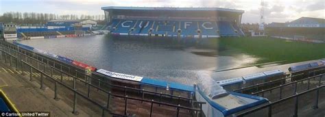 Carlisle United's Brunton Park stadium left submerged following heavy ...