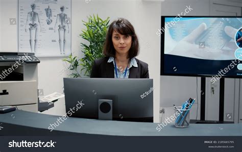 Portrait Receptionist Working Hospital Reception Desk Stock Photo 2185665795 | Shutterstock