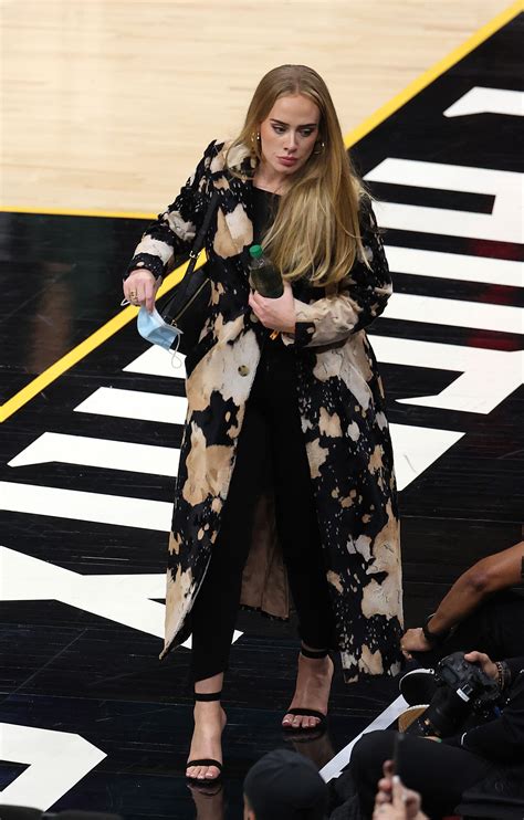 Adele makes a style slam dunk at NBA Finals alongside Rich Paul