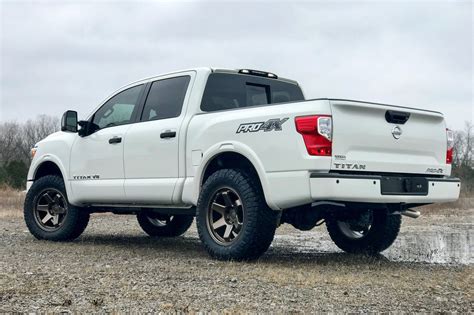 White Nissan Titan Fitted With TSW Off-road Wheels | Nissan titan, Nissan, Nissan trucks