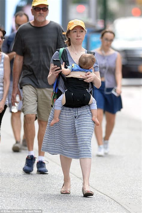 Chelsea Clinton takes baby son Aidan for a walk in NYC | Daily Mail Online