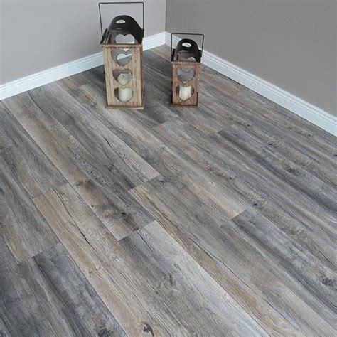 Add this Harbour Oak Grey laminate flooring wide plank to your home or business for an authentic ...