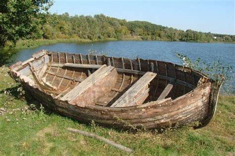 Ruined Vintage Wooden Boat On Riverside Royalty Free Stock Photo ... | Old boats, Wooden boats ...