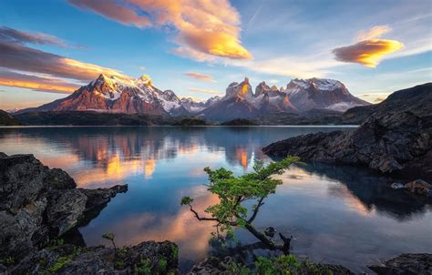 Wallpaper the sky, clouds, mountains, lake, rocks, Chile, Patagonia, Lake Pehoe, Timothy Poulton ...